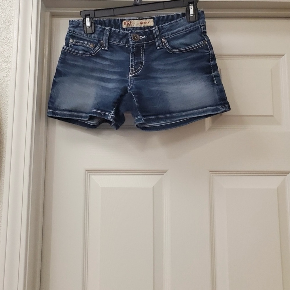 BKE Sabrina Dark Blue Jean Shorts are a size 25.